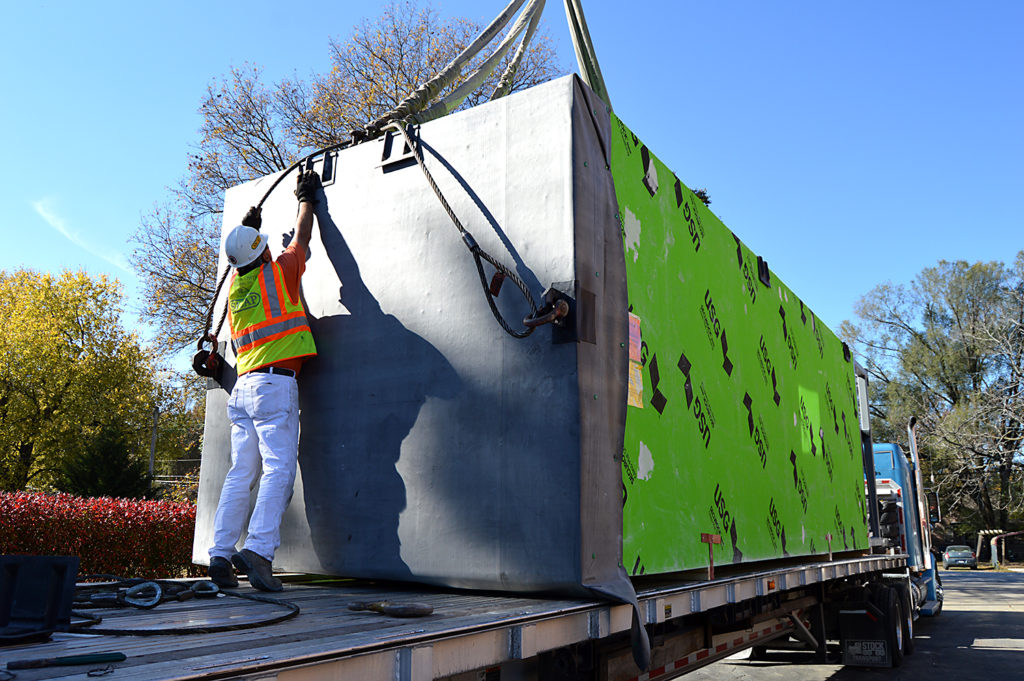 Modular elevator rigged for crane