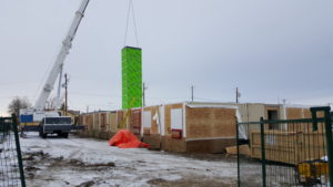 Weather halts construction. Modular manufacturing is not effected by cold weather. 