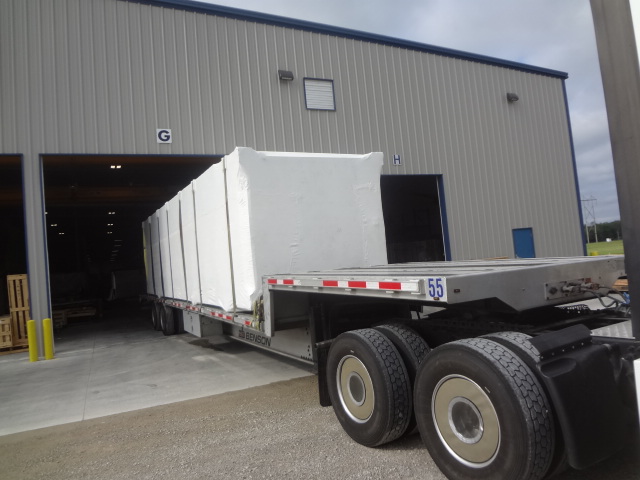 modular elevator leaving the factory on a truck
